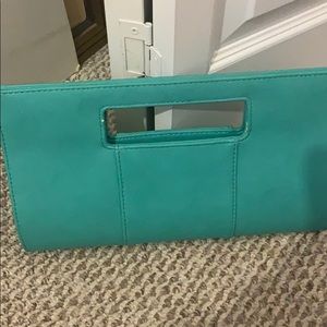Adorable teal leather clutch purse